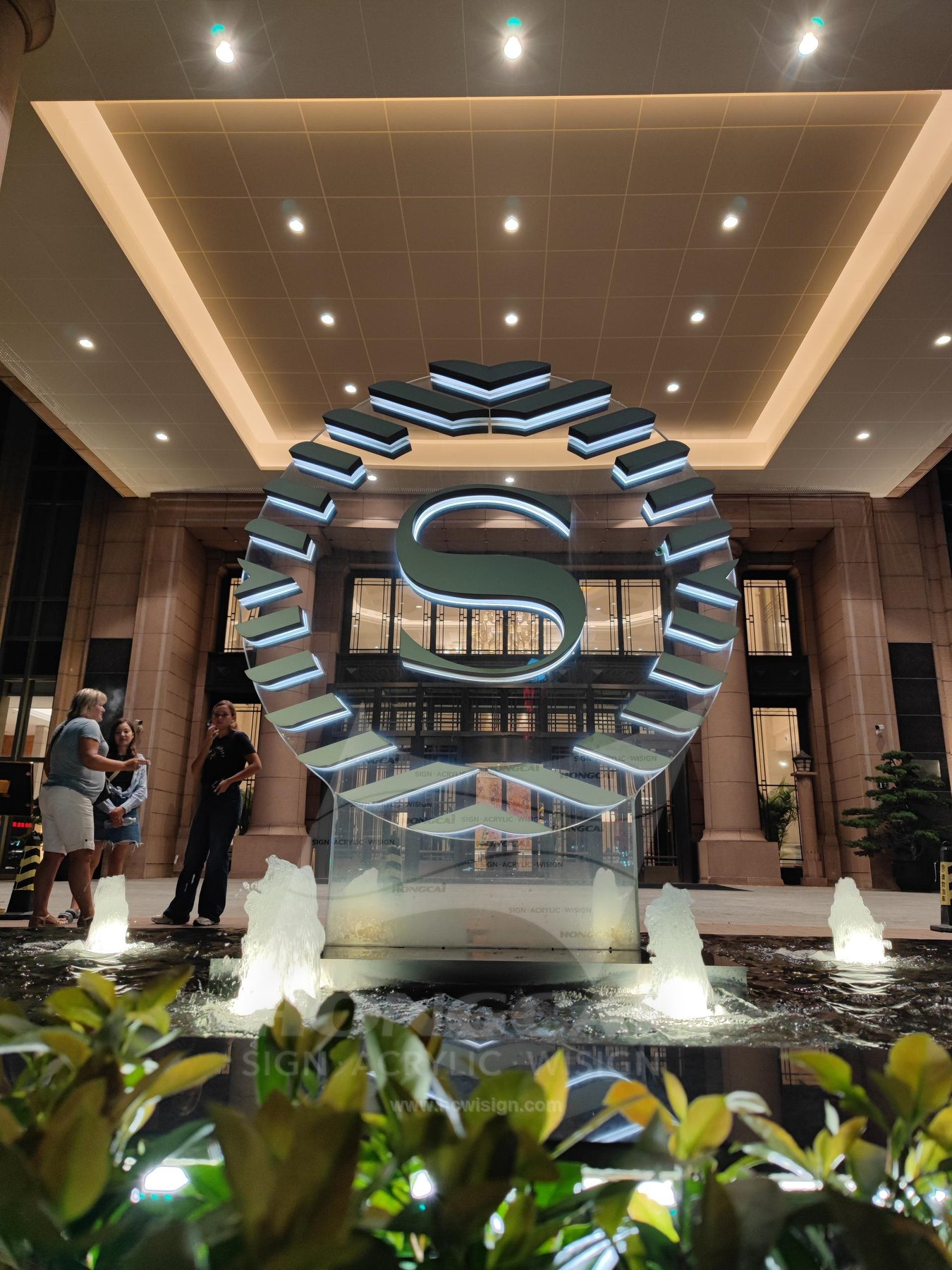 Conductive glass logo sign for the lobby welcome feature pool at Sheraton Shanghai Pudong Hotel